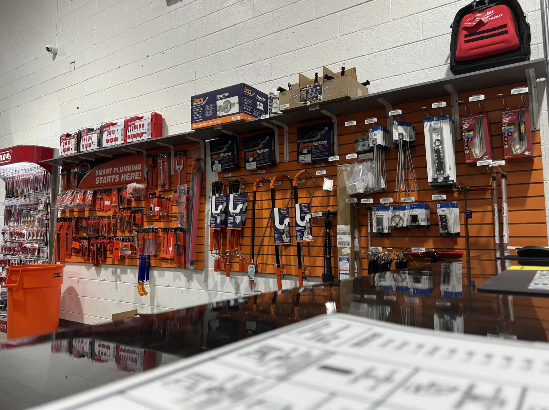 Hajoca Wilmington NC Wholesale Plumbing Supply House tools behind front counter